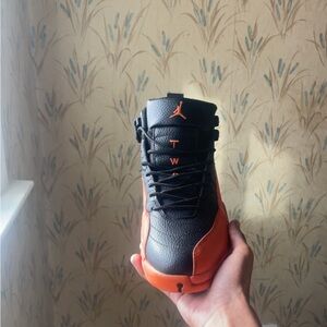 Jordan Men's Black and Orange High-Top Sneakers. read description